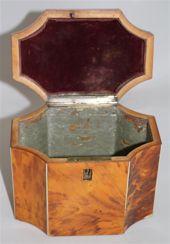 A 19th century tortoiseshell work box, a similar tea caddy and another small box, work box W. 7in.